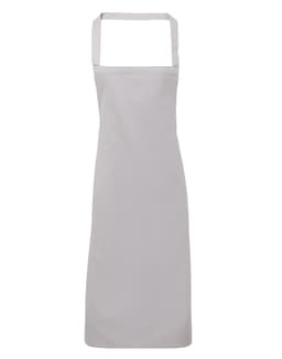 A grey 100% organic cotton bib apron with straps and an unembellished design. It has a simple, clean look.