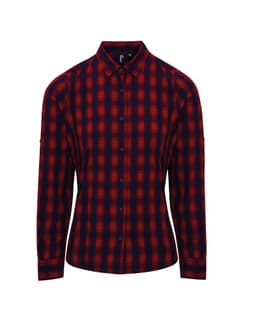 A women's long-sleeve button-up shirt in red and navy check pattern, featuring a collar and a logo.