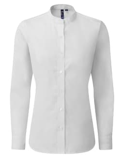 A white women's banded collar grandad shirt with long sleeves and a button-up front. It features a logo.
