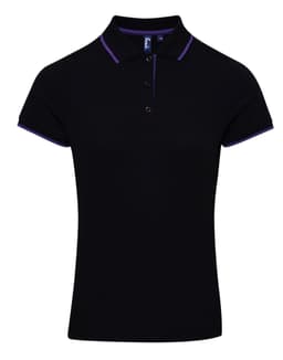 A women's black polo shirt featuring contrast purple trim and a logo on the chest. Short sleeves and a classic collar.