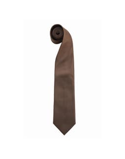 A rolled brown silk tie with a pointed tip, featuring a branding logo.