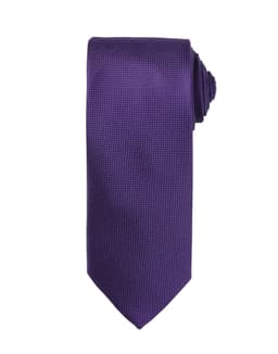 A purple micro waffle tie with a textured pattern and a rounded end, featuring a logo.