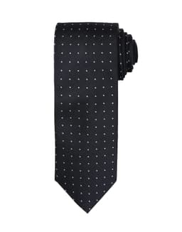 A black tie with a micro dot pattern, neatly rolled, featuring a logo.