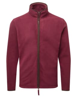 A maroon polar fleece jacket with a full zip and high collar, featuring a small logo on the front.