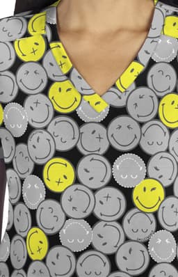 A patterned top featuring grey and yellow smiley faces on a black background with a V-neck design.