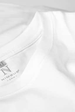 A white T-shirt featuring a rounded neckline and a logo on the inner label.