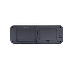 A black wireless charging speaker with multiple ports and buttons on the back, featuring a logo.