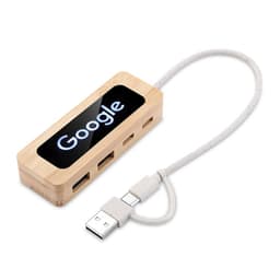 A bamboo USB hub with a white cable, featuring a logo on a black surface.