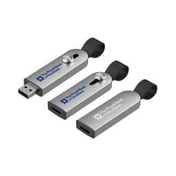 A silver Avior Flash Drive with a logo, featuring a USB-A and USB-C connector, and a rubber loop for attachment.