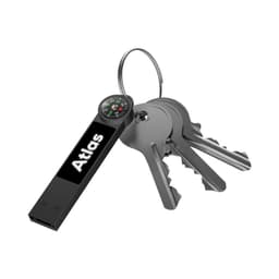 A black Atlas LED flash drive attached to a keyring alongside several keys, featuring a compass on the end.