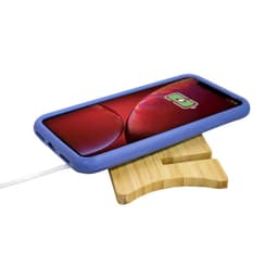 A blue wireless charging stand with a wooden base and a smartphone positioned on top, displaying a charging icon.