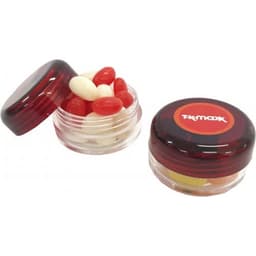 A small transparent screw cap jar contains red and white jelly beans, with a red lid featuring a logo.