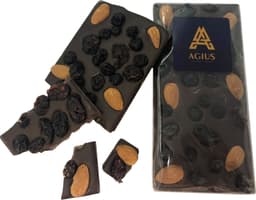 A chocolate bar with almonds and dried berries, presented in a clear package with a logo. Dark and rich in colour.