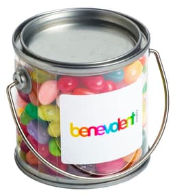 A small clear PVC bucket filled with colourful JELLY BELLY jelly beans, featuring a silver handle and a branding label.