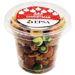 A clear tub filled with a mix of colourful nuts and savoury snacks, featuring a festive lid with a logo.