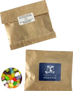 A kraft paper bag containing 50g of colourful JELLY BELLY jelly beans, featuring a logo on the front.