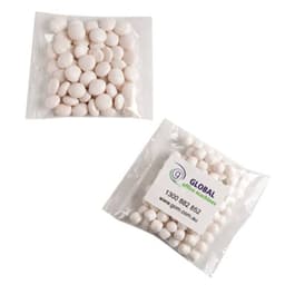 A resealable pack containing white mints, with a logo on the packaging.