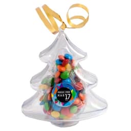 Acrylic Christmas tree filled with colourful M&Ms and topped with a gold ribbon.
