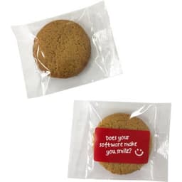 Gluten-free biscuits in a clear cellophane bag, showcasing a golden-brown colour and featuring a branded label.