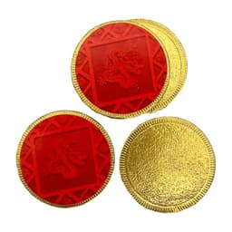 Red and gold chocolate medallions with intricate designs, featuring both red and gold finishes, arranged in a group.