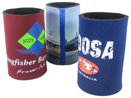 Three coloured can coolers featuring various designs and logos, in red, blue, and a multi-coloured option.
