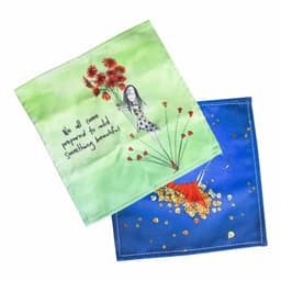 Two lens cloths featuring vibrant colours, one with a green background and floral design, the other in blue with an artistic illustration.