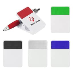 A white fridge magnet clip with a textured coloured section at the top, available in green, black, and blue. Includes a pen.