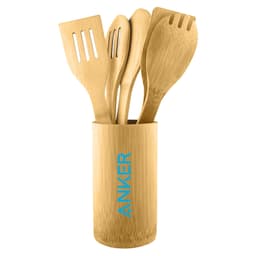 A bamboo cutlery set in a matching holder, featuring four utensils including a spatula, spoon, and slotted spatula.