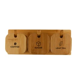 Three bamboo jars labelled for coffee, sugar, and leaf tea, mounted on a wooden base. Each jar has a circular design.