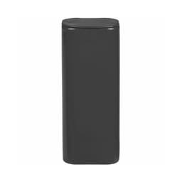 A sleek black flip-top tin container for mints, featuring a smooth finish and a subtle logo.