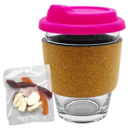 A glass coffee cup with a pink lid and cork band, accompanied by a pack of mixed lollies in various colours.
