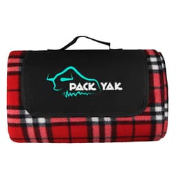 A red and black checkered picnic blanket featuring a black flap and a logo. It has a carrying handle for convenience.