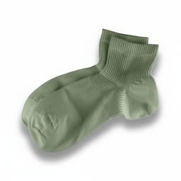 A pair of light green ribbed socks with a crew length design, featuring a logo.