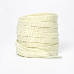 A bundle of cream-coloured shoe laces, neatly coiled and featuring pointed tips. Includes a logo on the packaging.