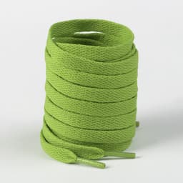 A stack of bright green shoelaces, tightly coiled, with pointed ends for easy threading.