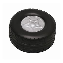 A black stress relief toy shaped like a tyre, featuring a silver rim in the centre. It has a textured surface.