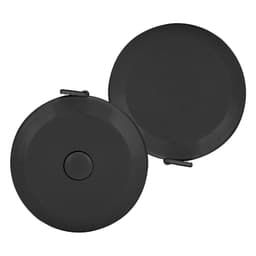 A compact black tape measure featuring a circular design with a button and a clip attachment.