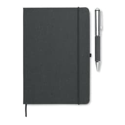 A dark grey notebook with a pen placed beside it. The notebook features an elastic closure and a textured cover.