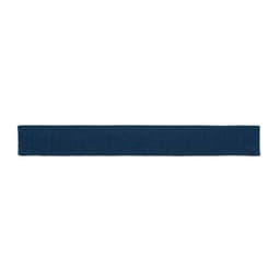 A rectangular navy blue product with a textured appearance and a logo on one side.