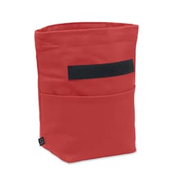 A storage bag in vibrant red fabric featuring a front pocket and a black velcro strap.