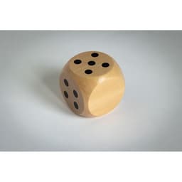 A wooden dice with black dots, showcasing numbers on its faces against a plain background.