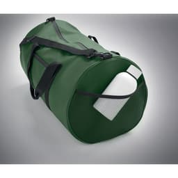 A green duffle bag with a white drink bottle partially visible in a side pocket. The bag features black straps.