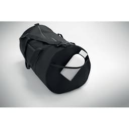 A black duffel bag featuring a white drink bottle partially visible from the side pocket.