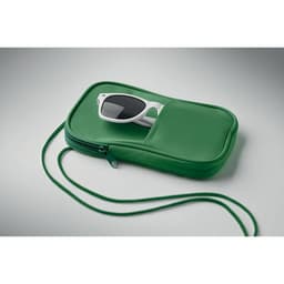 A green pouch with a zip and a strap, featuring a pair of sunglasses peeking out from a front pocket.