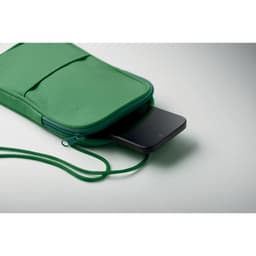 A green pouch with a zipper, partially open, revealing a black smartphone inside. It has a strap for carrying.