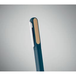 A pen featuring a sleek design with a navy blue body and a wooden accent on the clip.