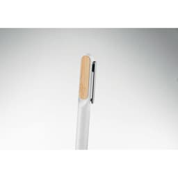 A pen with a white body and a bamboo accent, featuring a clip for securing it. It has a simple, modern design.