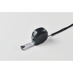 A black tape measure with a retractable silver measuring tape. It features a loop for easy handling.