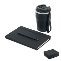 A black drink bottle, notebook with a pen, and a small box, all arranged together.