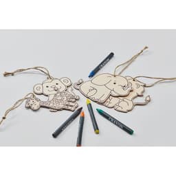 A set of wooden animal tags featuring an elephant and a giraffe, accompanied by colourful crayons.